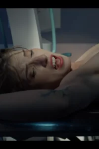 Octavia Red is strapped down