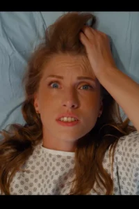 Octavia Red wakes up in the hospital