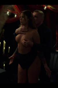 Grabbing her busty boobies